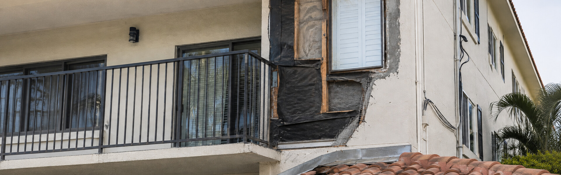 Defective stucco, waterproofing, and roof work at a Florida condominium